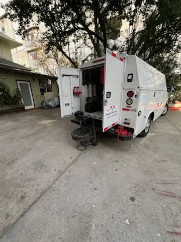 Magnet Plumbing service vehicle on-site for Grease Trap Cleaning in Seven Stars